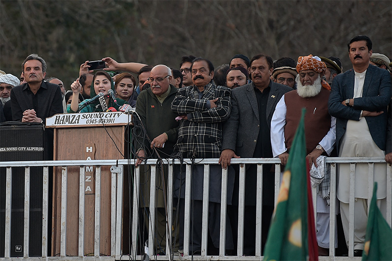 Maryam Nawaz Sharif (2L), daughter of former Pakistan’s Prime Minister Nawaz Sharif and a leader of opposition alliance Pakistan Democratic Movement (PDM) addresses a protest rally in Islamabad on January 19, 2021. (AFP)