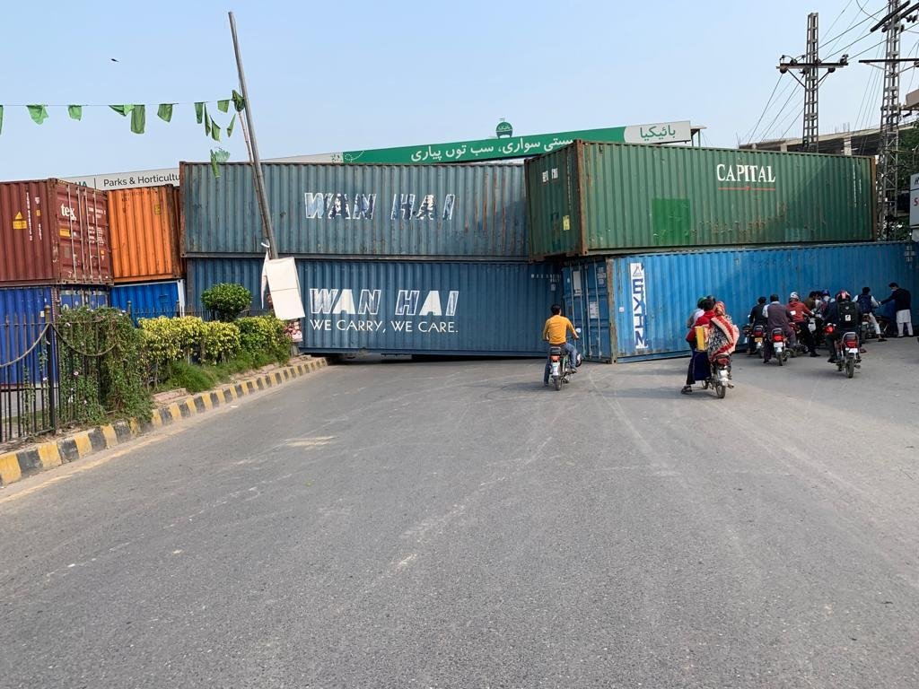 A view of a road in Islamabad, Pakistan sealed with containers ahead of the planned long march by the banned Tehreek-i-Labbaik Pakistan (TLP) on Oct. 22, 2021. (Photo courtesy: Social Media)