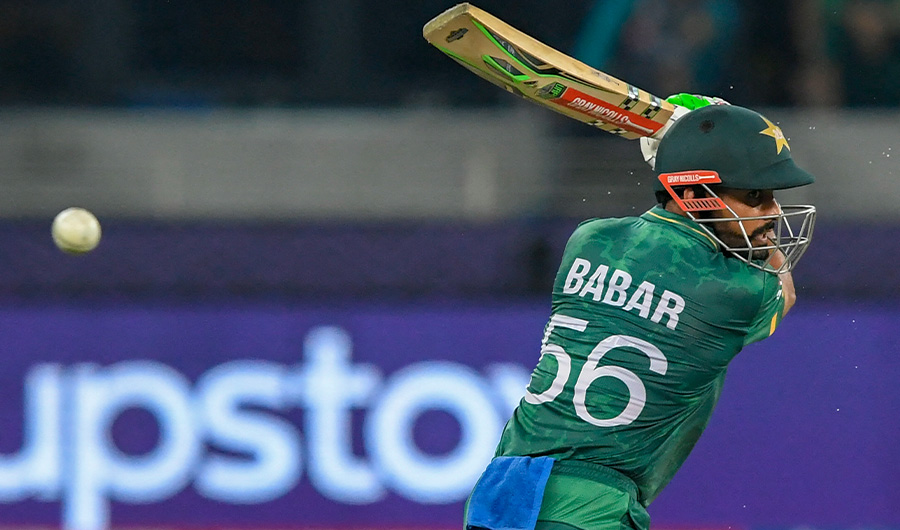 Pakistan's captain Babar Azam plays a shot during the ICC men’s Twenty20 World Cup cricket match between India and Pakistan at the Dubai International Cricket Stadium in Dubai on October 24, 2021. (AFP)
