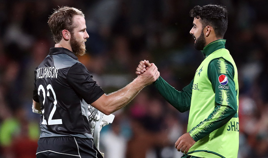 New Zealand’s Kane Williamson and Pakistan’s Shadab Khan (R) shake hands after the second T20 international cricket match between New Zealand and Pakistan at Seddon Park in Hamilton on December 20, 2020. (AFP/ FILE)