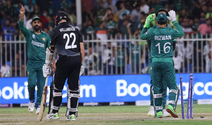 New Zealand's captain Kane Williamson (2L) reacts after being run out during the ICC men’s Twenty20 World Cup cricket match between Pakistan and New Zealand at the Sharjah Cricket Stadium in Sharjah on October 26, 2021. (AFP)