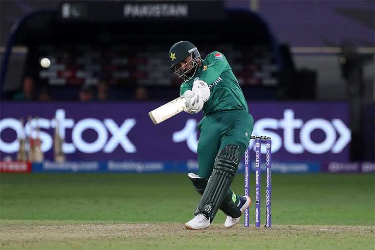 Pakistan's Asif Ali plays a shot during the Cricket Twenty20 World Cup match between Pakistan and Afghanistan in Dubai, UAE, Friday, Oct. 29, 2021. (AFP)