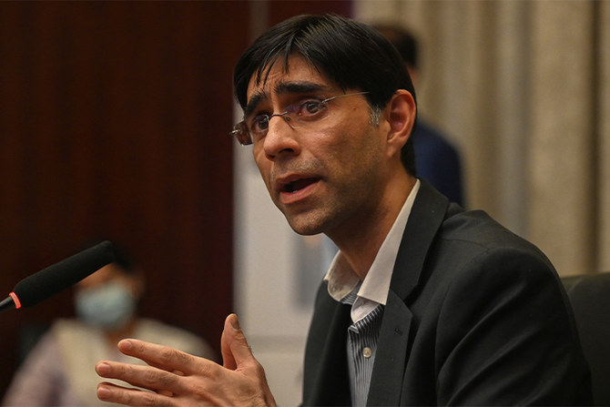 Pakistan's national security advisor Moeed Yusuf gestures as he speaks to members of the media in Islamabad on September 15, 2021. (AFP)
