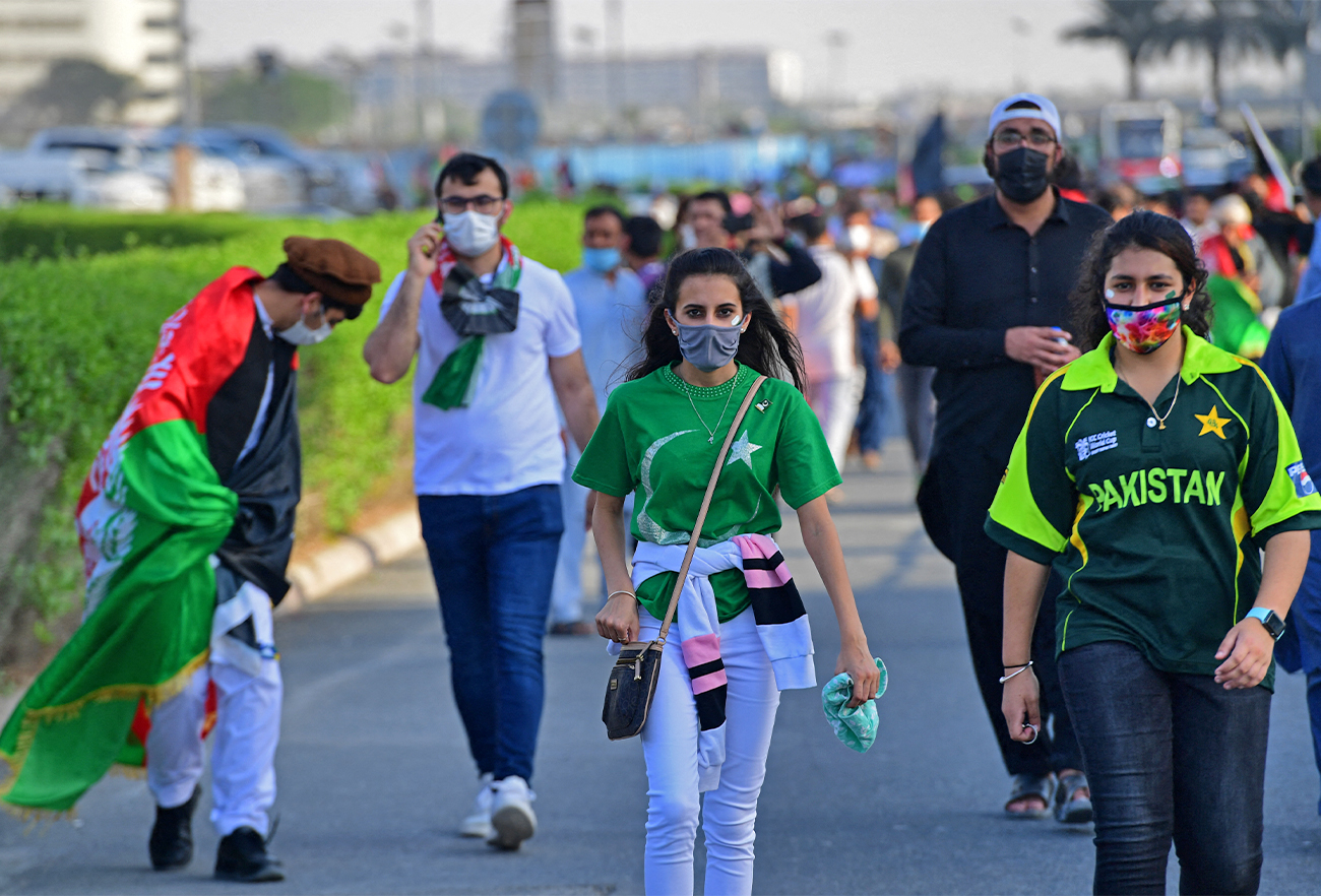 Fans of Afghanistan's and Pakistani teams arrive to watch the ICC mens Twenty20 World Cup cricket match between Afghanistan and Pakistan at the Dubai International Cricket Stadium in Dubai, UAE, on October 29, 2021. (AFP)