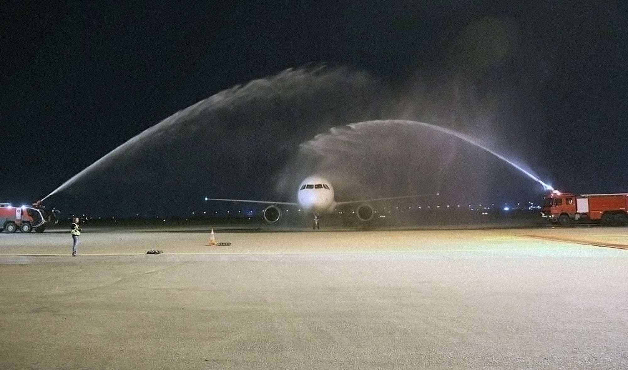 Pakistan International Airlines (PIA) aircraft receives a water salute at Najaf Airport, Iraq, on October 30, 2021. (Photo courtesy: @pakiniraq/Twitter)