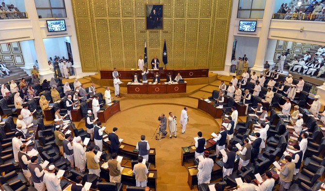 Pakistani legislators of Baluchistan province assembly stand in an assembly session in Quetta on August 15, 2008. (AFP/ File)