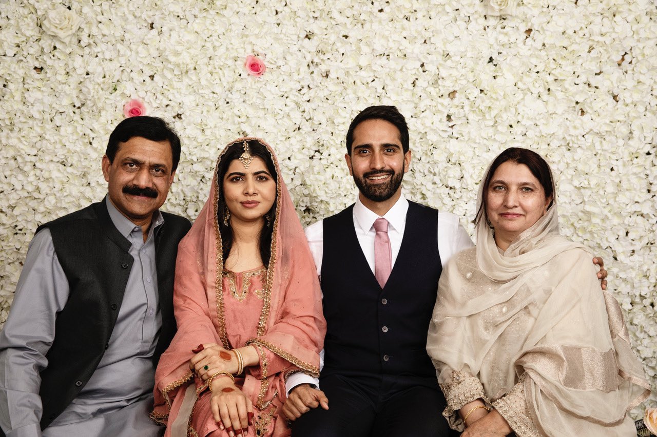 Pakistani Nobel Peace Prize laureate Malala Yousafzai, second from left, poses with her family on her wedding day in their home in Birmingham, England, on November 9, 2021. (Photo courtesy: @Malala/Twitter)