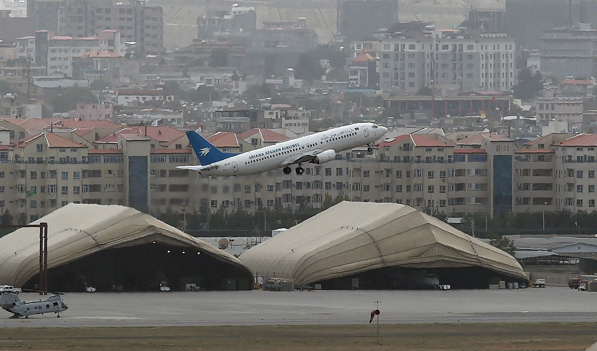 This picture taken on August 14, 2021 shows an Ariana Afghan Airlines aircraft taking-off from the airport in Kabul, Afghanistan. (AFP/File)