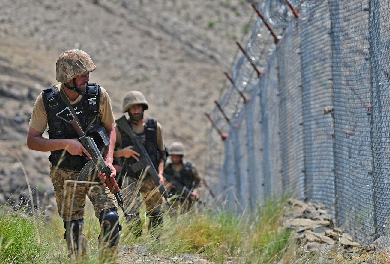Pakistani troops patrol along Pakistan-Afghanistan border fence at Big Ben post in the Khyber district of the Khyber Pakhtunkhwa province on August 3, 2021. (AFP/File)