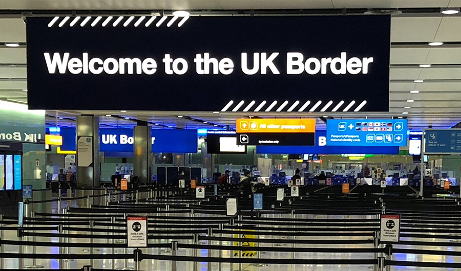 A UK border sign welcomes passengers on arrival at Heathrow airport in west London on December 31, 2020.