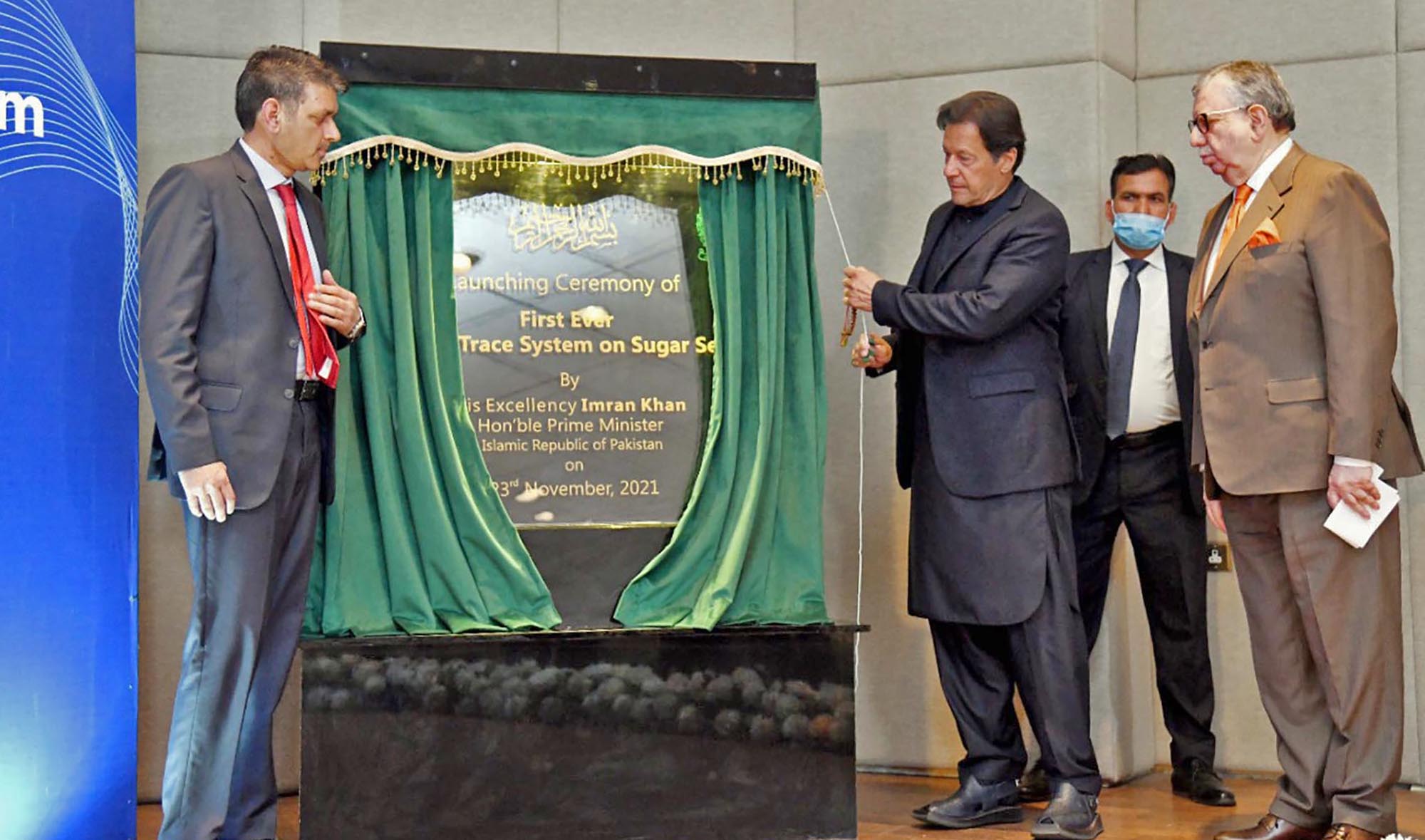 Pakistan Prime Minister Imran Khan, third right, inaugurates Track and Trace System on Sugar Sector in Islamabad on November 23, 2021. (PID)
