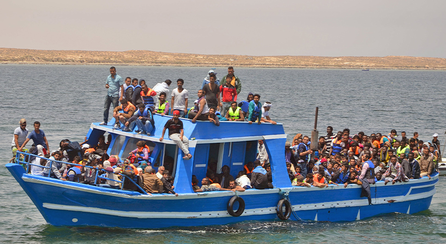 Illegal migrants are seen on a boat after being rescued by the Tunisian navy off the coast near Ben Guerdane, Tunisia, June 10, 2015. (REUTERS/File)
