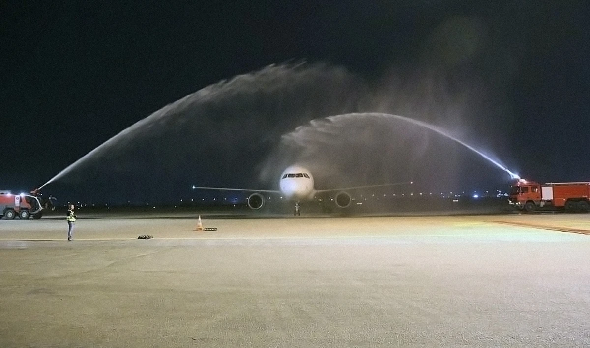 Pakistan International Airlines (PIA) aircraft receives a water salute at Najaf Airport, Iraq, on October 30, 2021. (Photo courtesy: @pakiniraq/Twitter)