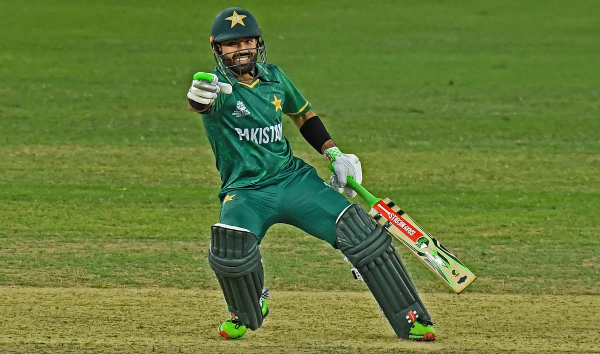 Pakistan's Mohammad Rizwan reacts as he takes a run during the ICC men’s Twenty20 World Cup semi-final match against Australia at the Dubai International Cricket Stadium, UAE, on November 11, 2021. (AFP)