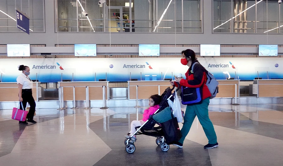 Passengers arrive for American Airlines flights at O'Hare International Airport on February 05, 2021 in Chicago, Illinois. (AFP)