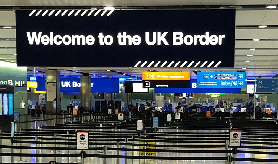 A UK border sign welcomes passengers on arrival at Heathrow airport in west London on December 31, 2020.