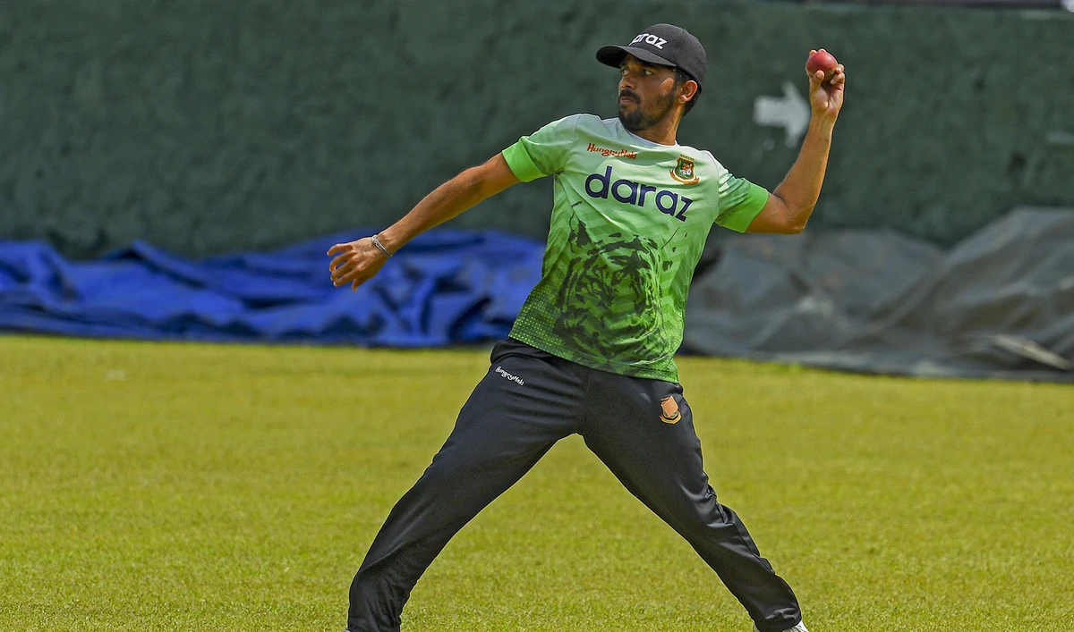 Bangladesh's cricket captain Mominul Haque throws a ball during a practice session at the Pallekele International Cricket Stadium in Kandy, Sri Lanka on April 20, 2021. (AFP/File)