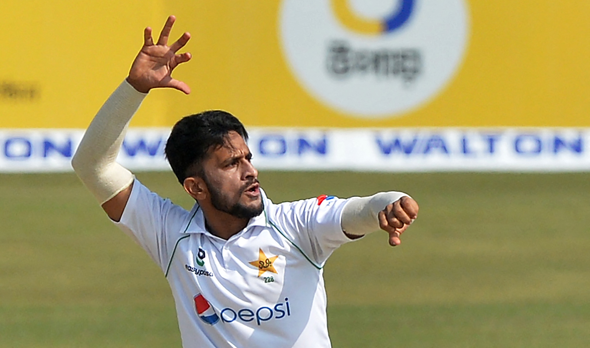 Pakistan's Hasan Ali celebrates after taking the wicket on the second day of the first Test cricket match against Bangladesh at Zahur Ahmed Chowdhury Stadium in Chittagong on November 27, 2021. (AFP/File)