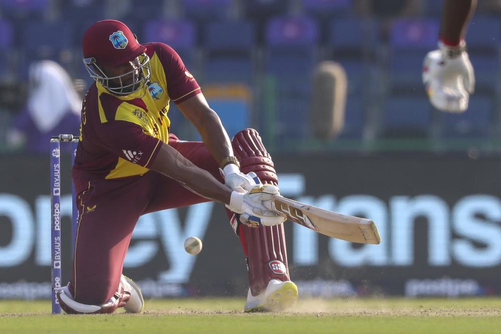 West Indies' captain Kieron Pollard bats during the Cricket Twenty20 World Cup match between Australia and the West Indies in Abu Dhabi, UAE, Saturday, Nov. 6, 2021. (AP)