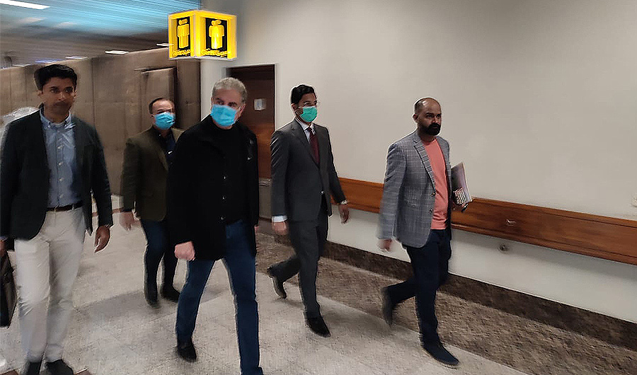 Pakistan’s Foreign Minister Shah Mahmood Qureshi (3rd from R) leaves Islamabad for Belgium on Dec 6, 2021. (Pakistan Foreign Office)