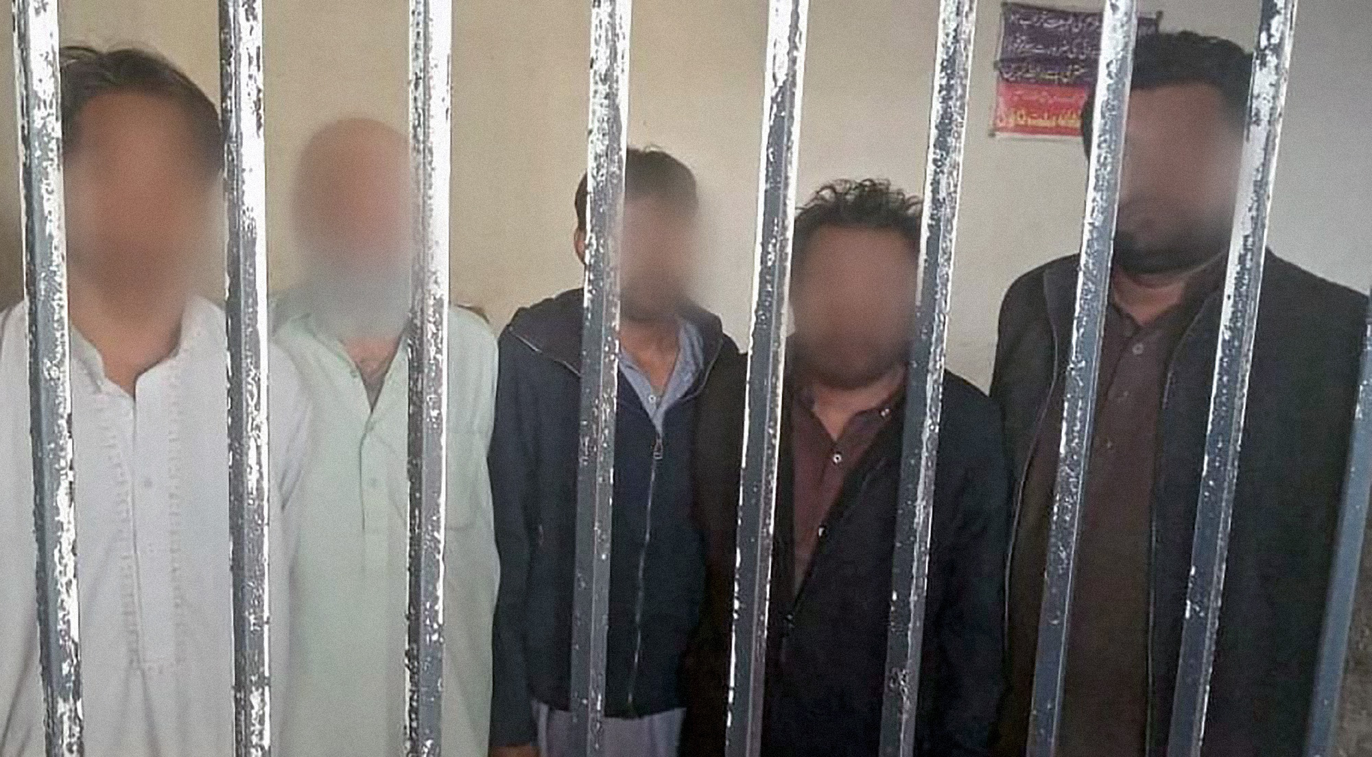 This photograph released by the Punjab Police on December 7, 2021, shows men arrested on charges of assaulting four women, stripping them naked and filming them in Faisalabad, Pakistan. (Photo courtesy: @OfficialDPRPP/Twitter)