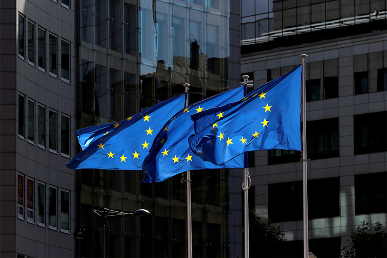 European Union flags flutter outside the European Commission headquarters in Brussels, Belgium August 21, 2020. (REUTERS)