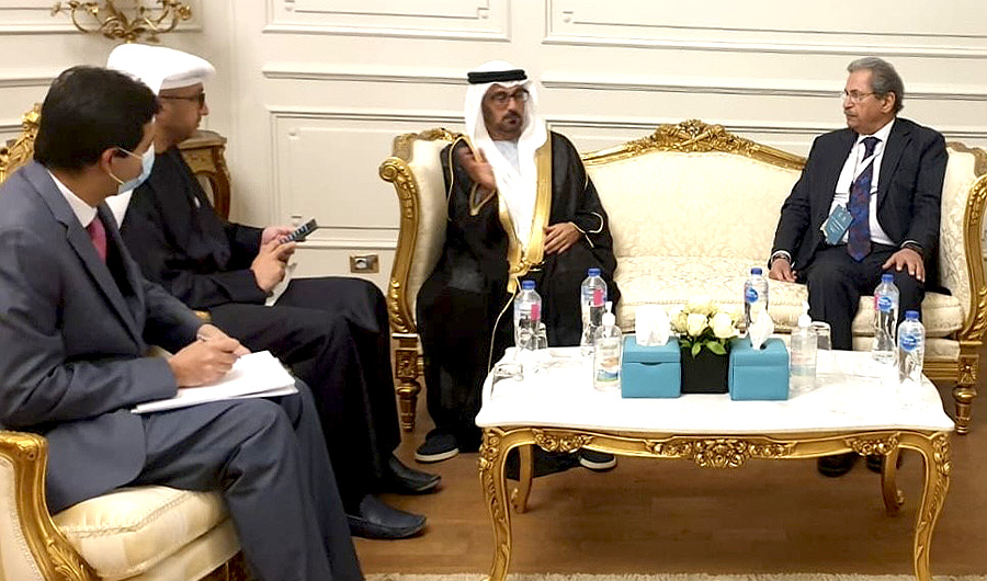 Pakistan's Education Minister Shafqat Mehmood, right, meets with his Emirati counterpart Hussein bin Ibrahim Al Hammadi in Cairo, Egypt on December 8, 2021. (Photo courtesy: @EduMinistryPK/ Twitter)