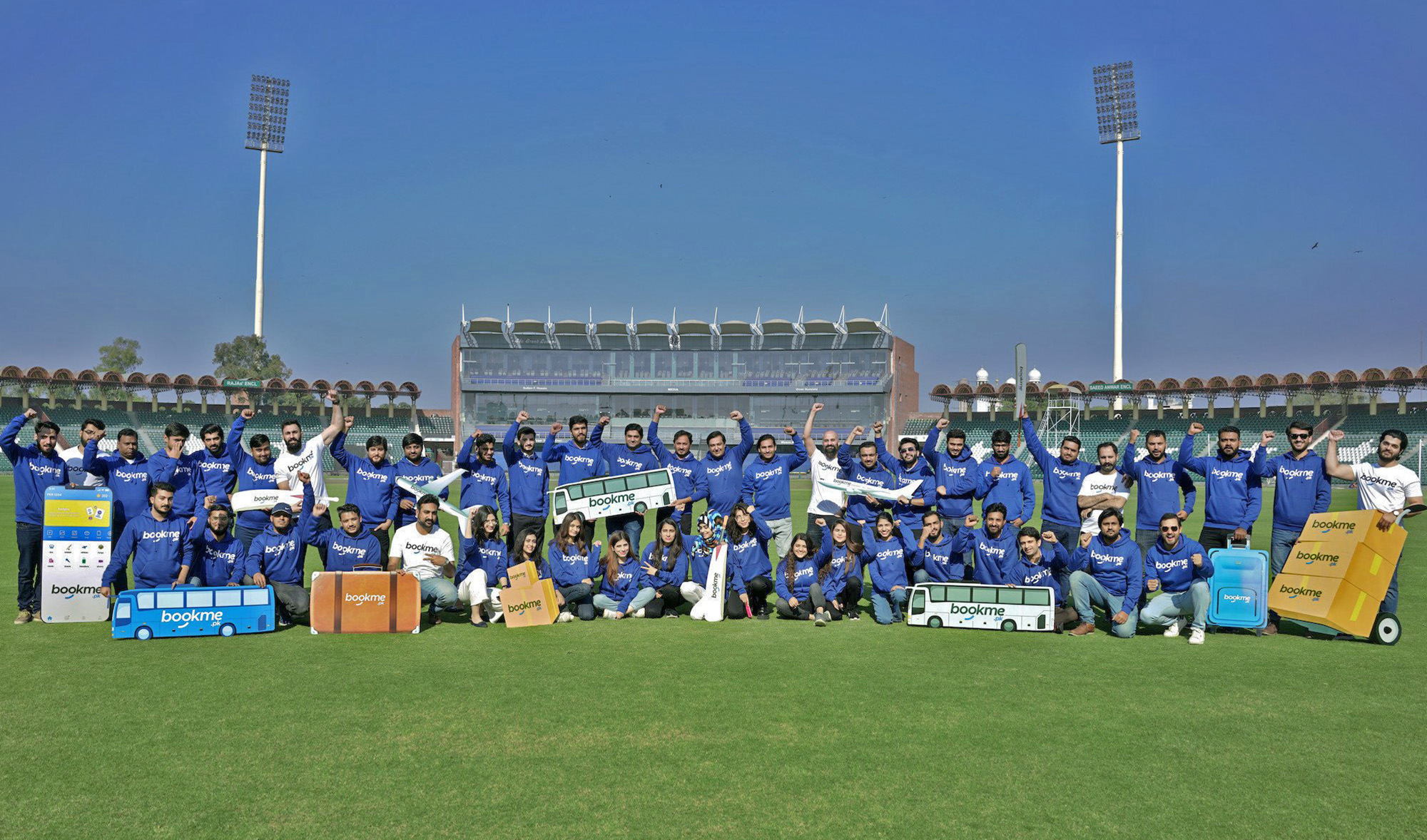 Employees of a local e-ticketing and travel platform, Bookme.pk, pose for a photograph in Lahore, Pakistan, on December 8, 2021. (Photo courtesy: Bookme.pk)