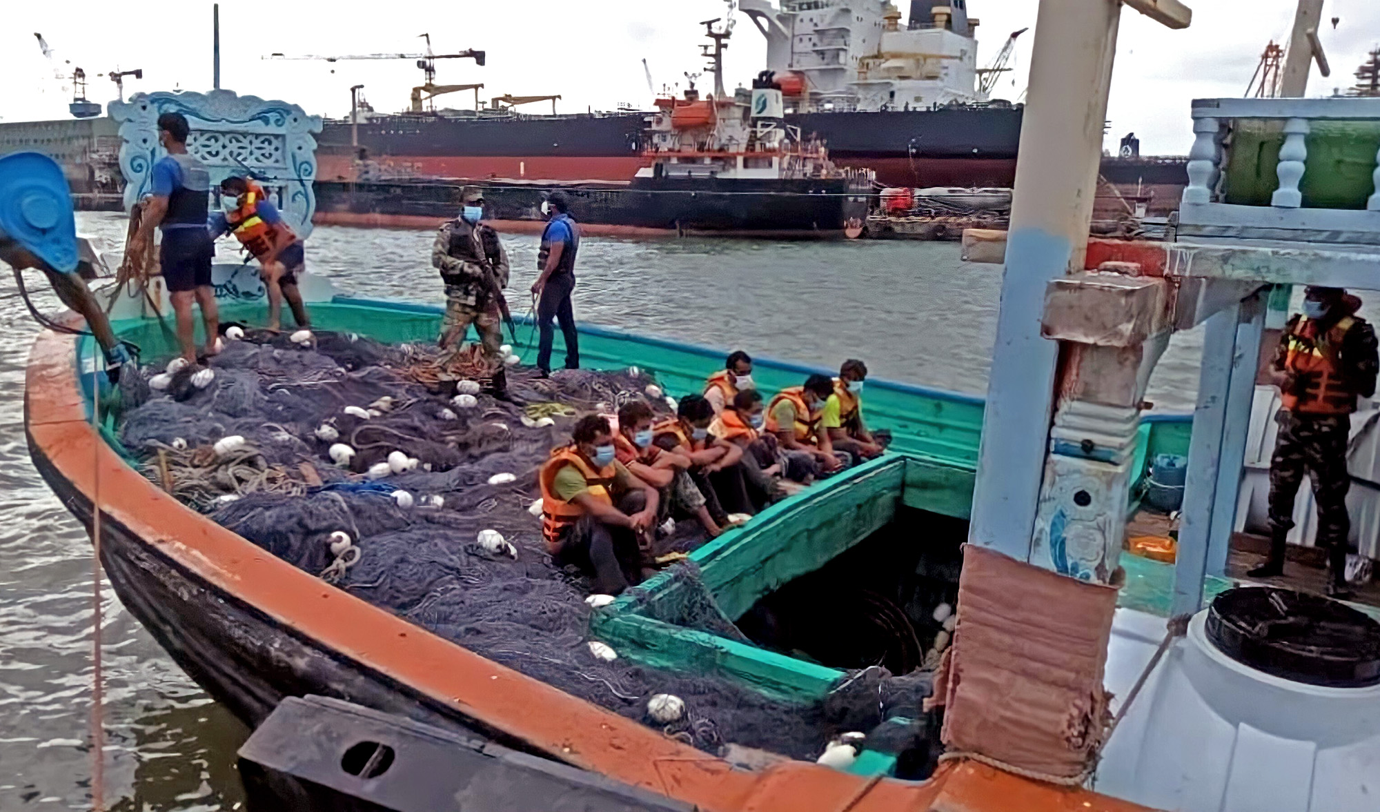 In this undated photo, Sri Lankan Navy seizes a fishing boat and its crew carrying narcotics. (Photo courtesy: social media)