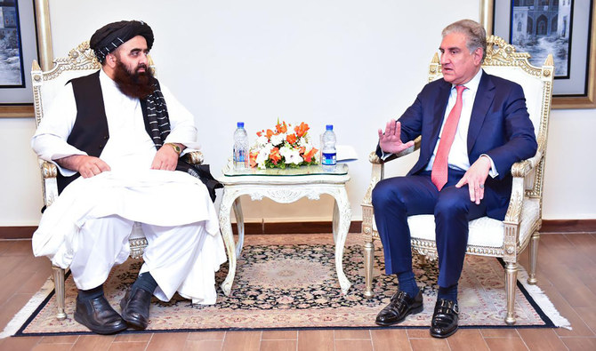 Afghanistan's acting foreign minister Amir Khan Muttaqi, left, with Pakistan's FM Shah Mahmood Qureshi in Islamabad, Pakistan, on December 18, 2021. (Photo courtesy: Pakistan foreign office)
