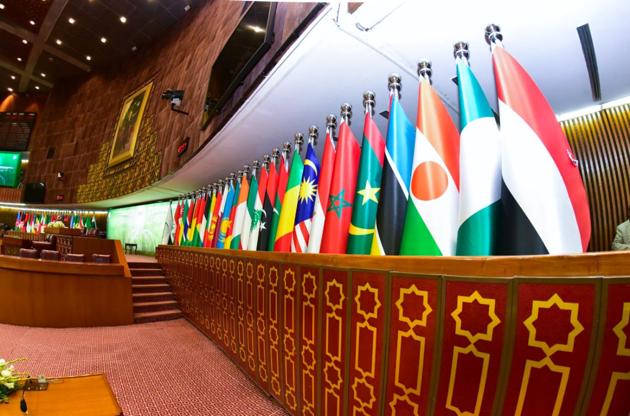 Flags of OIC member states can be seen at the National Assembly ahead of the 17th Extraordinary Session of its Council of Foreign Ministers in Islamabad, Pakistan, on December 18, 2021. (Photo courtesy: National Assembly)
