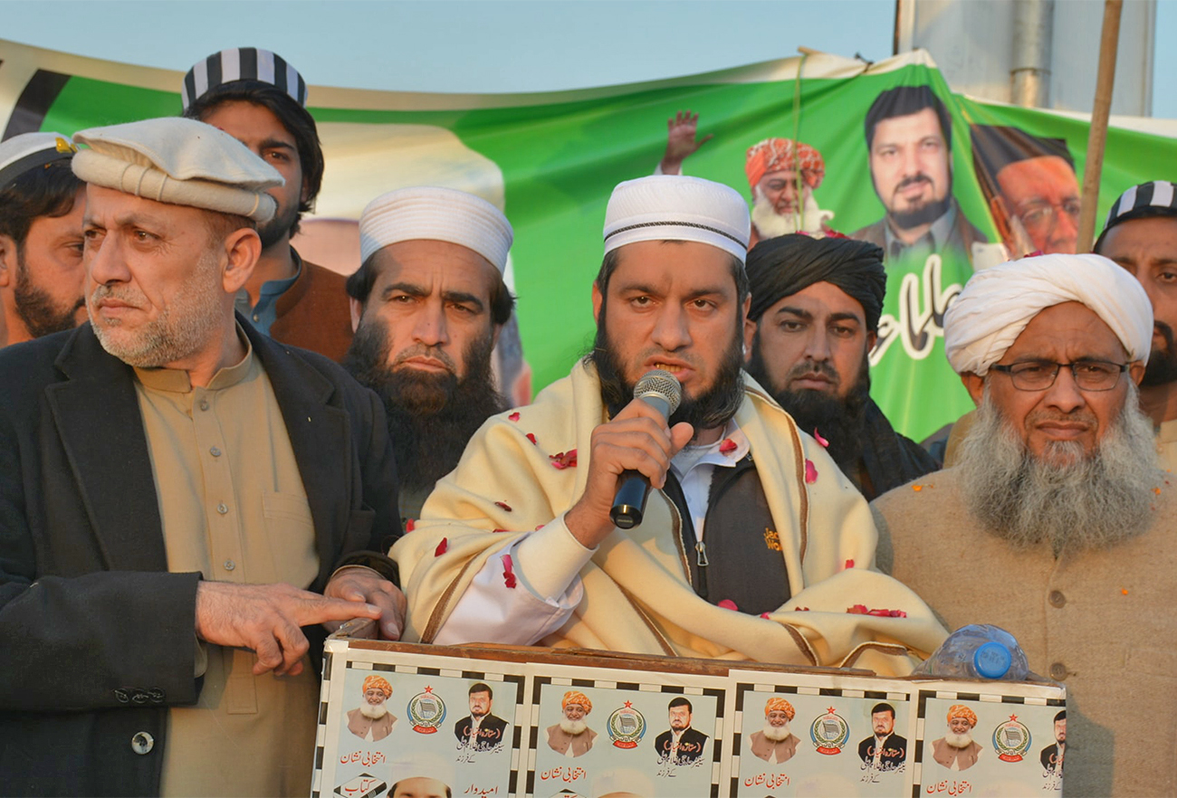 Jamiat Ulema-e-Islam-Fazl's candidate, Zubair Ali (center) who has won the mayor’s seat in Peshawar, addresses an election rally in Peshawar, Pakistan, on December 17, 2021. (Photo courtesy: Zubair Ali/Facebook)
