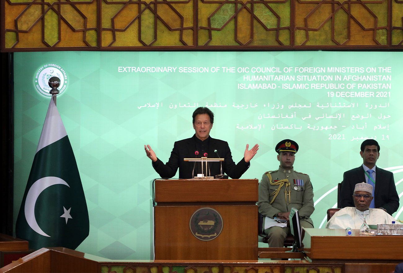 Pakistan Prime Minister Imran Khan, center, speaks during the 17th extraordinary session of Organization of Islamic Cooperation (OIC) Council of Foreign Ministers, in Islamabad, Pakistan, December 19, 2021. (AP)