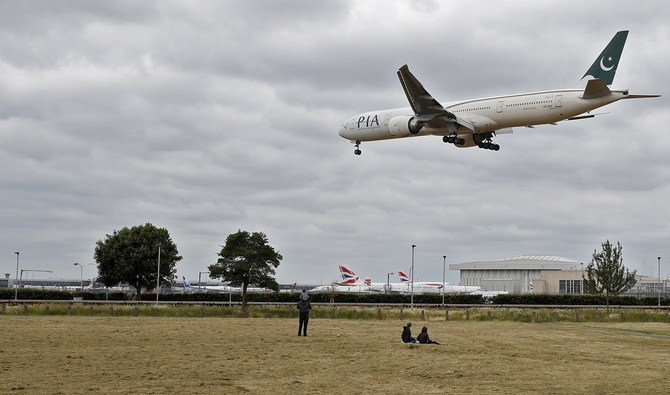 A Pakistan International Airlines Boeing 777 comes in to land at Heathrow airport in west London on June 8, 2020. (AFP/ File)