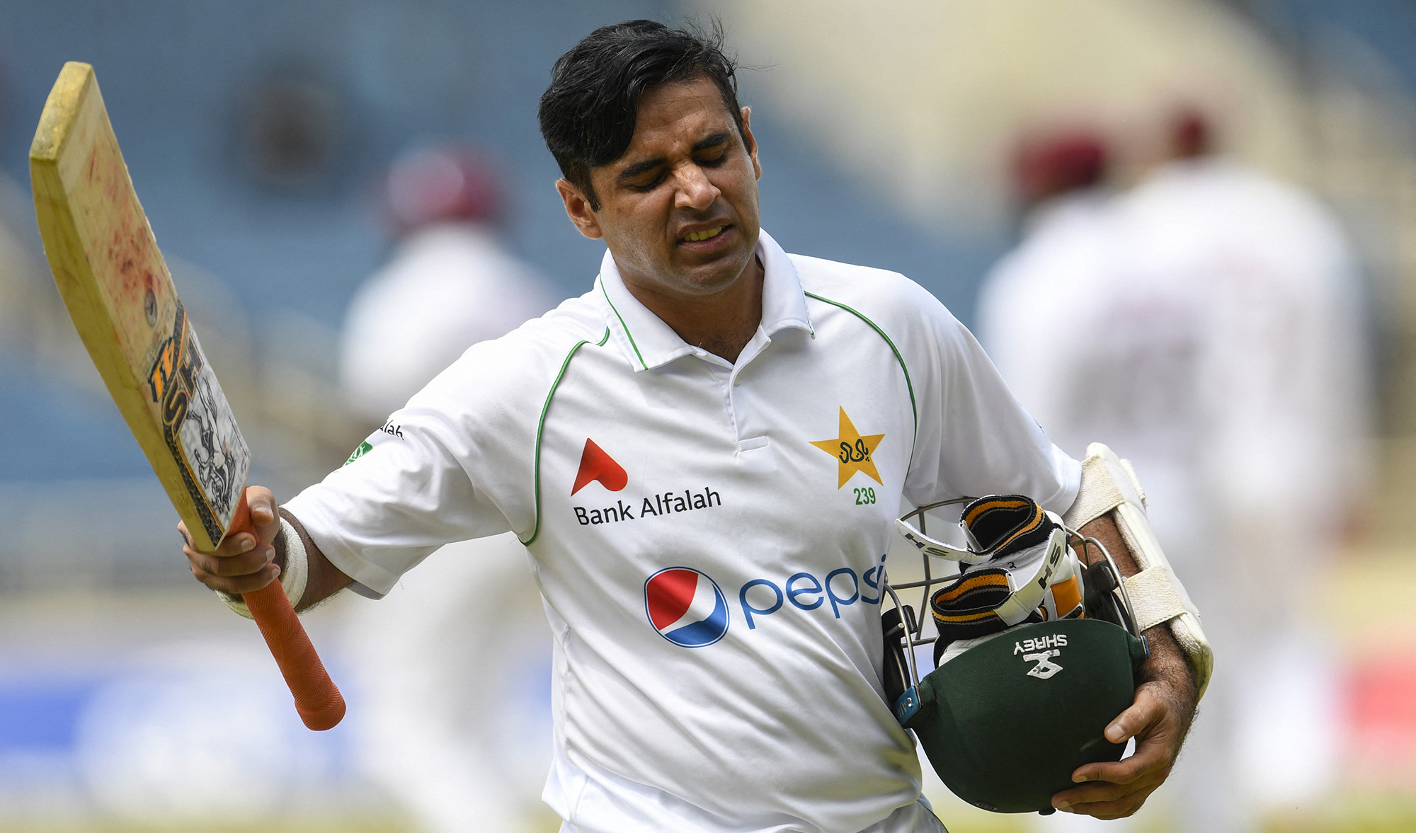Abid Ali of Pakistan walks off the field dismissed by Jayden Seales of West Indies during day 1 of the 1st Test match in Kingston, Jamaica, on August 12, 2021. (AFP/File)