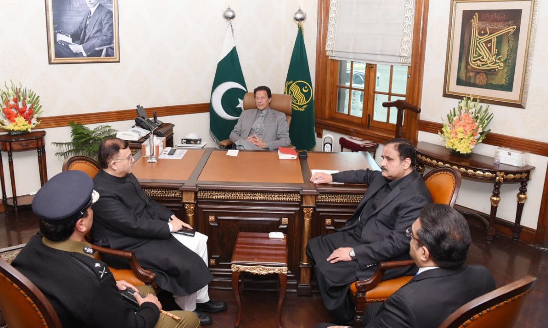 Punjab Chief Minister Usman Buzdar, chief secretary and principal secretary to the CM, and IG Punjab call on Prime Minister Imran Khan in Lahore, Pakistan on December 23, 2021. (PID Photo)