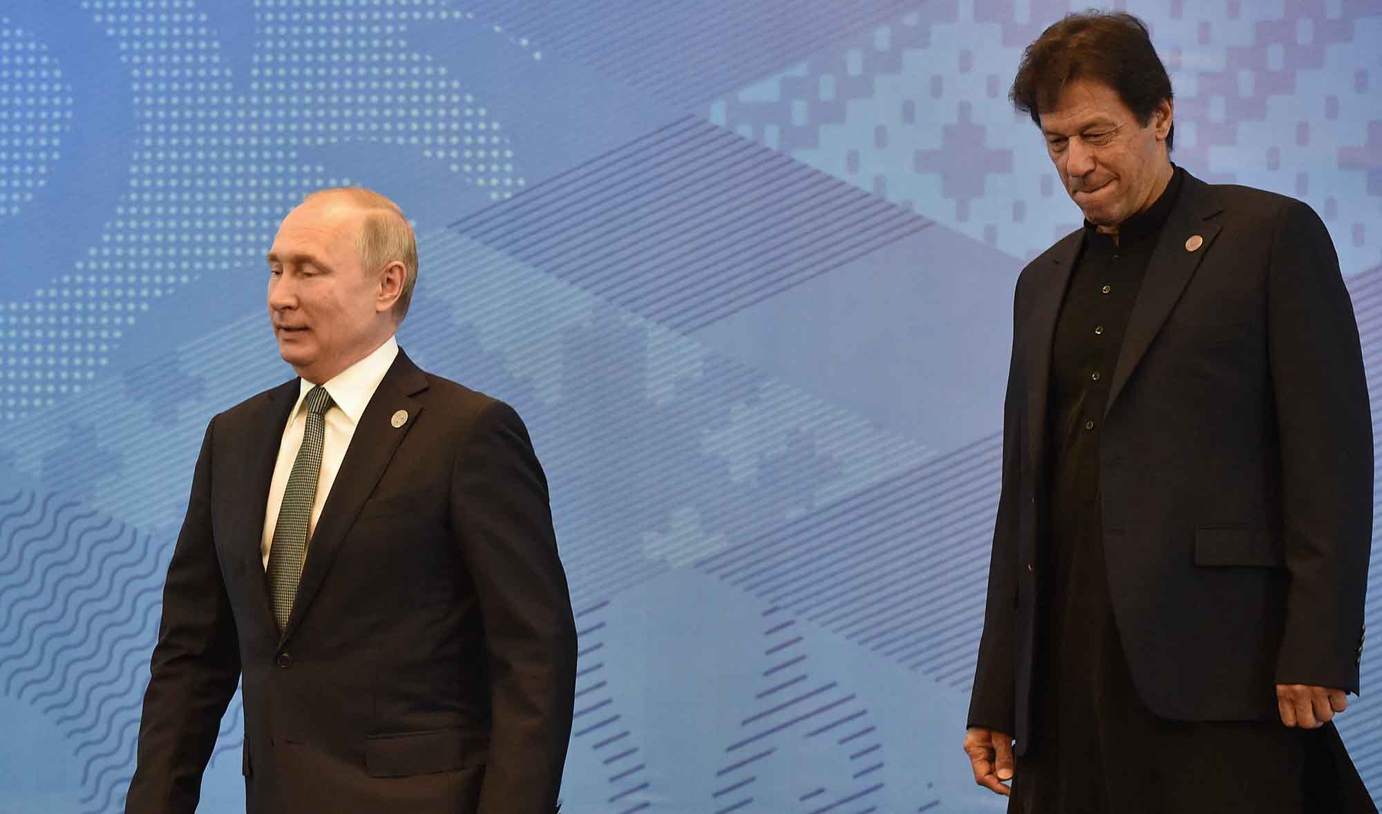 Russian President Vladimir Putin and Pakistani Prime Minister Imran Khan at the Shanghai Cooperation Organization's Council of Heads of State meeting in Bishkek, Kyrgyzstan, on June 14, 2019. (AFP/File)
