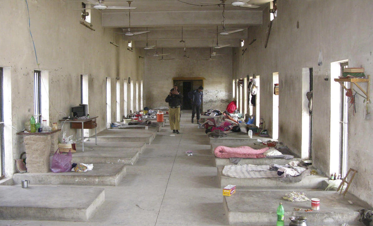 Pakistani police officers examine the main hall of a central jail in Bannu, 170 kilometer (106 miles) south of Peshawar, Pakistan on April 15, 2012. (AP/File)
