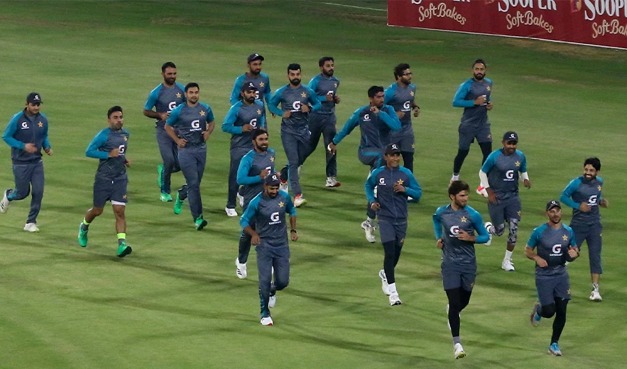 Players of Pakistan Cricket team warm up ahead of practice session at the National Stadium, in Karachi, Pakistan, Saturday, Dec. 11, 2021. (AP)