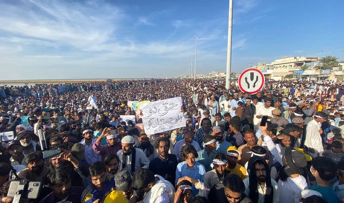 Thousands of demonstrators gather at Marine Drive in Gwadar, Pakistan, on December 10, 2021, to protest illegal trawling, token system at the Pak-Iran border and security checkpoints in their city. (AN Photo)