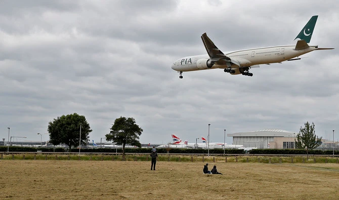 A Pakistan International Airlines Boeing 777 comes in to land at Heathrow airport in west London on June 8, 2020. (AFP/ File)