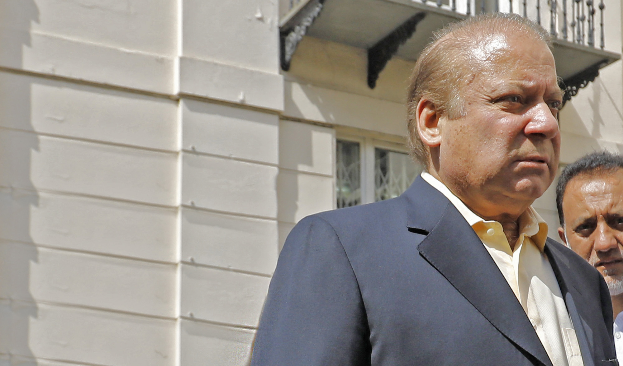 In this file photo, Pakistan's former prime minister Nawaz Sharif, center, arrives at his office in central London on July 6, 2018. (AFP/File)