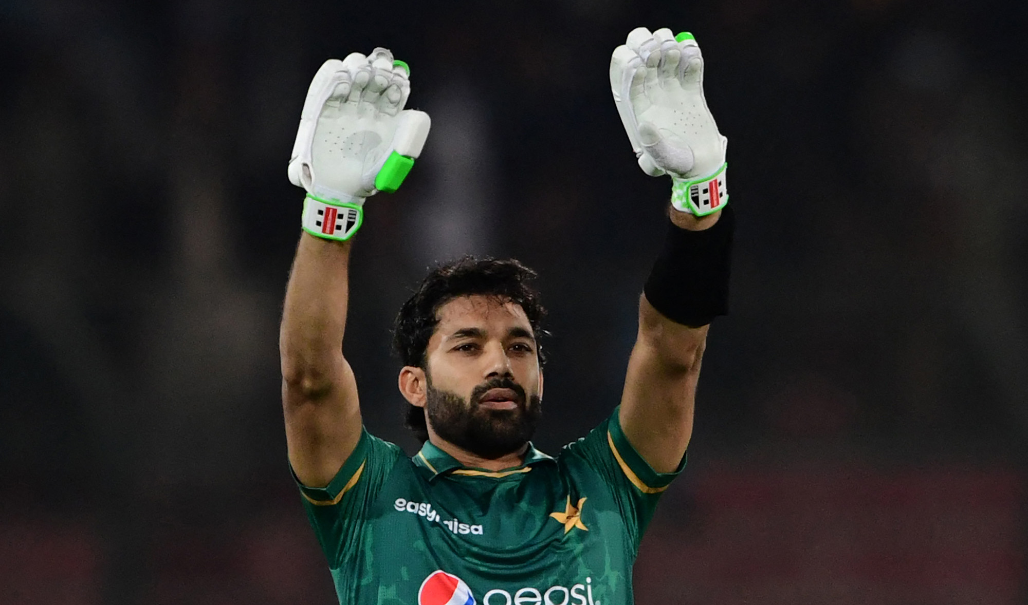 Pakistan's Mohammad Rizwan celebrates after scoring a half-century (50 runs) during the third Twenty20 international cricket match between Pakistan and West Indies at the National Stadium in Karachi on December 16, 2021. (AFP)