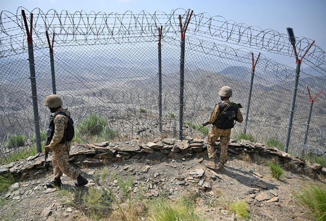 Pakistani troops are deployed near the Pak-Afghan border fence near the Big Ben Post in the province of Khyber Pakhtunkhwa on August 3, 2021. (AFP/File)