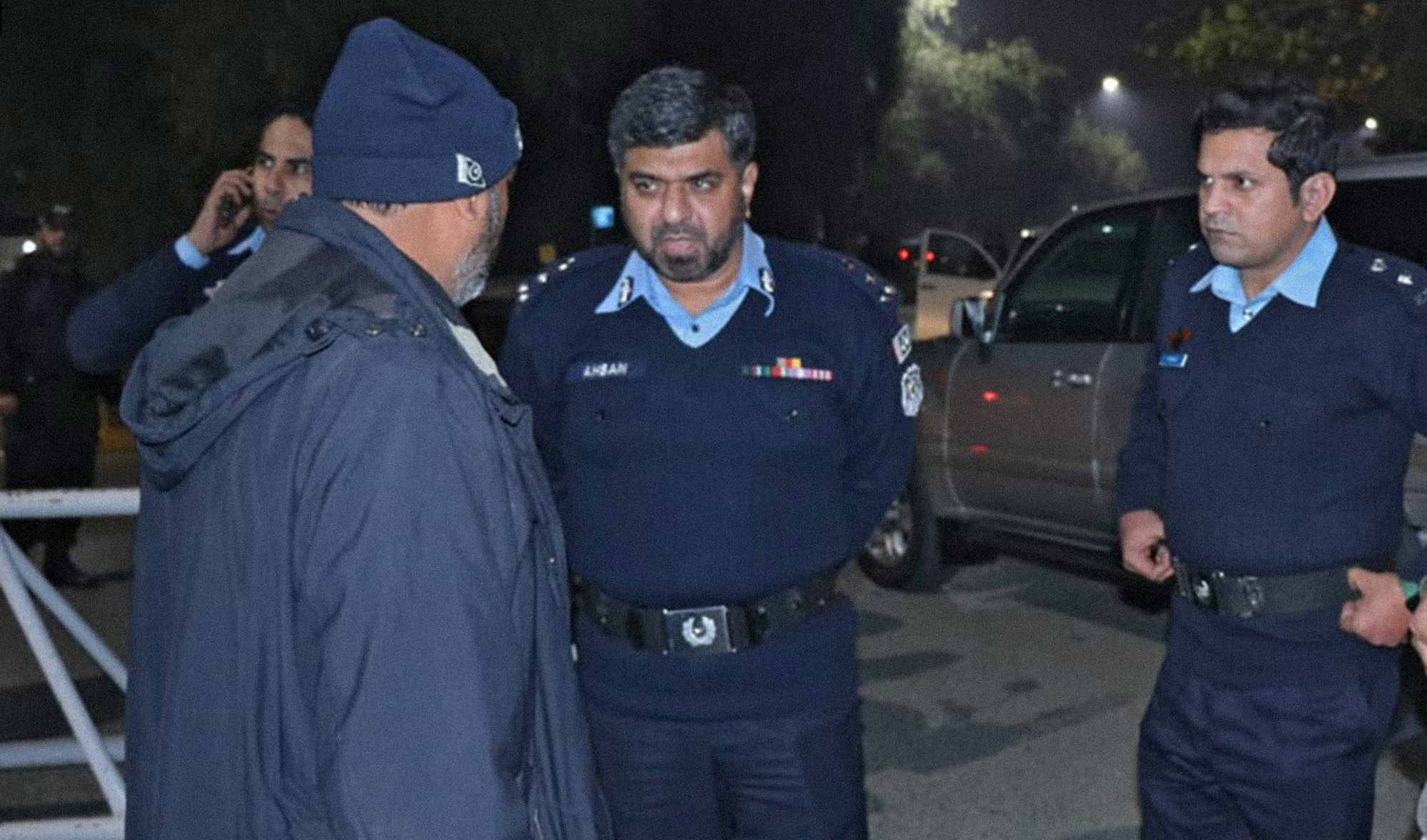 Islamabad police officers are seen at the site of a terrorist attack at a checkpoint in Pakistan's federal capital Islamabad on January 17, 2022. (Photo courtesy: Islamabad Police)