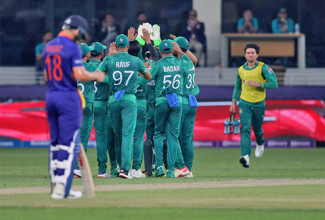 Pakistan's cricketers celebrate the dismissal of India's Suryakumar Yadav during the Cricket Twenty20 World Cup match between India and Pakistan in Dubai, UAE, on October 24, 2021. (AP/File)
