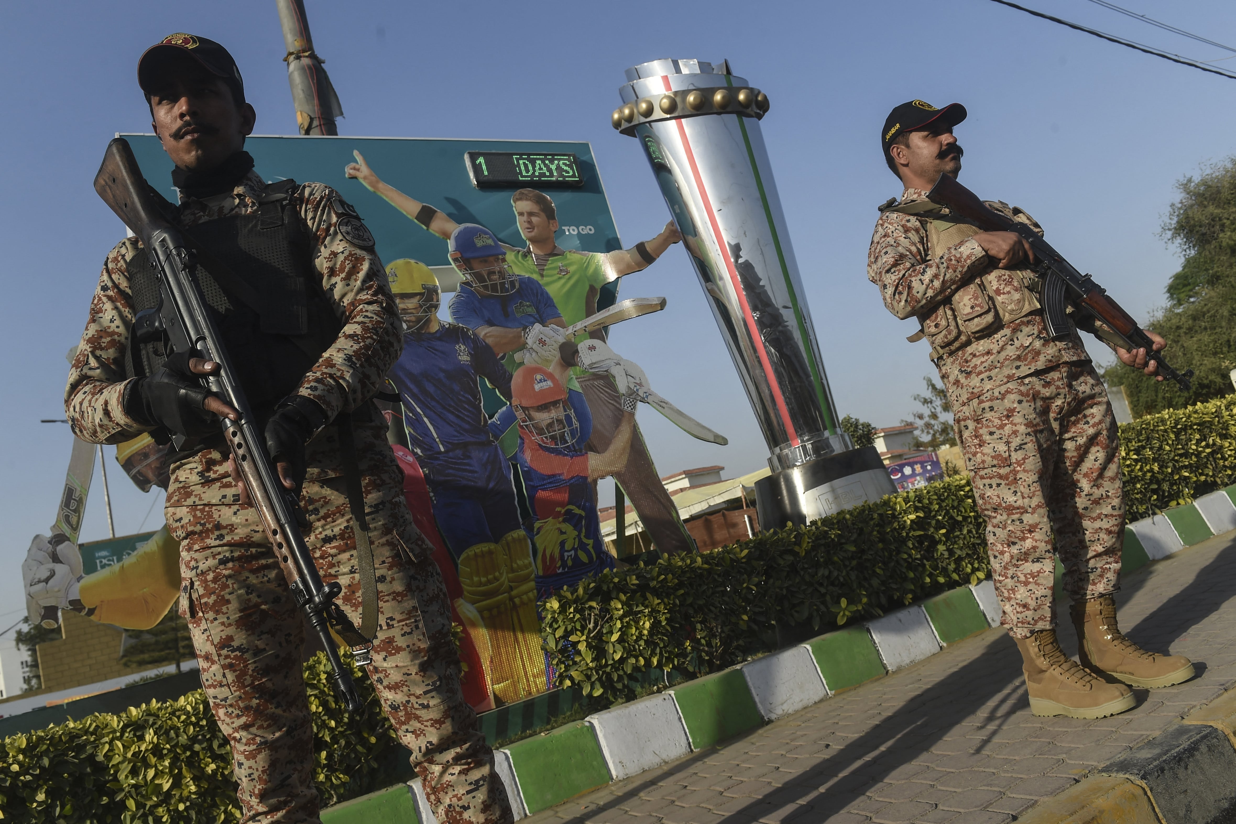 Paramilitary soldiers stand guard outside the National Cricket Stadium in Karachi on January 26, 2022. (AFP)