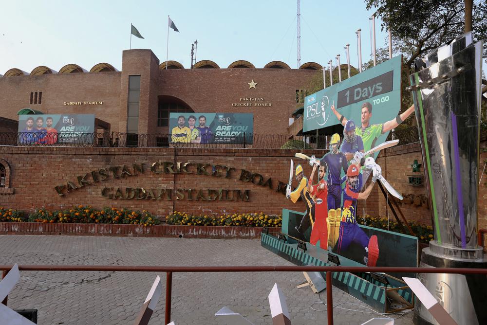 Cutouts of cricket players display outside the Gaddafi Stadium for the upcoming country's premier domestic Twenty20 tournament 'Pakistan Super League' in Lahore, Pakistan, Tuesday, Jan. 25, 2022. (AP)
