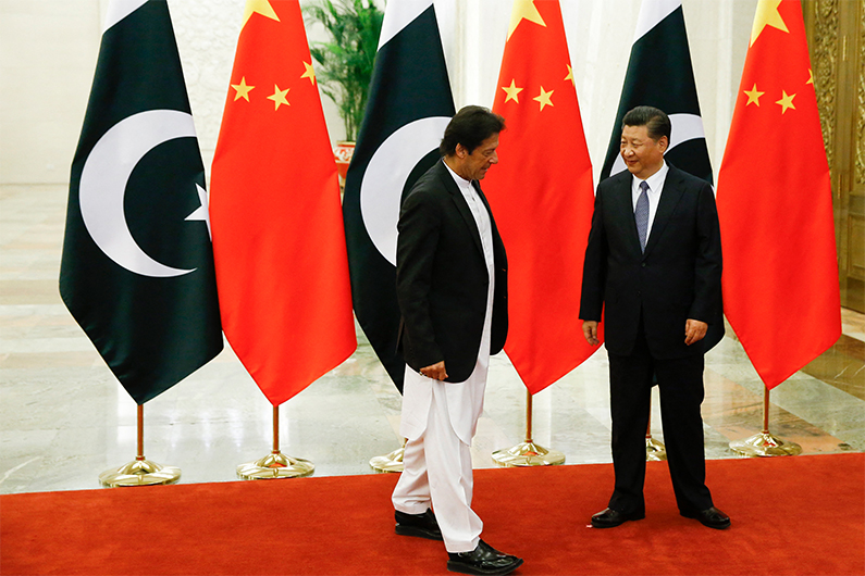 China's President Xi Jinping (R) meets with Pakistan's Prime Minister Imran Khan (L) at the Great Hall of the People in Beijing on November 2, 2018. (AFP/FILE)