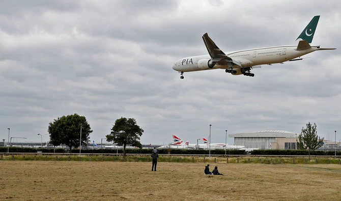 A Pakistan International Airlines Boeing 777 comes in to land at Heathrow airport in west London on June 8, 2020. (AFP/ File)